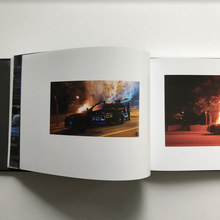 Load image into Gallery viewer, This Book Contains Pictures of Police Vehicles On Fire
